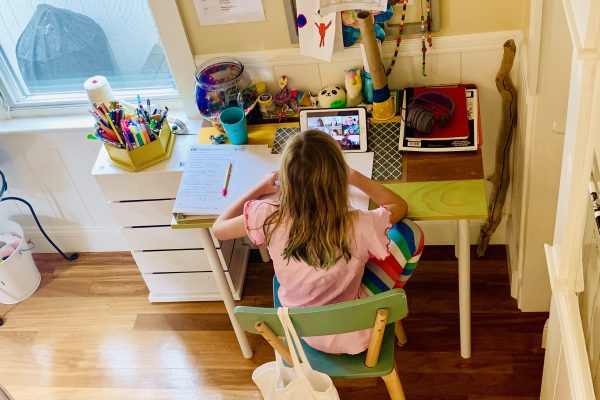 Photo of girl sitting at desk working